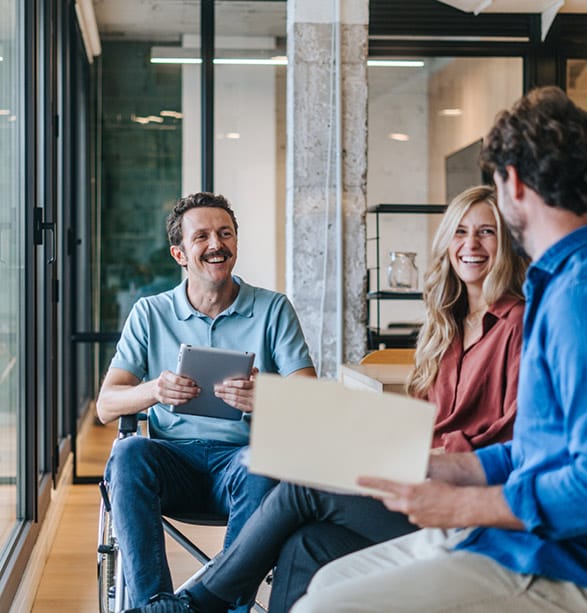 People sitting in an office having a conversation